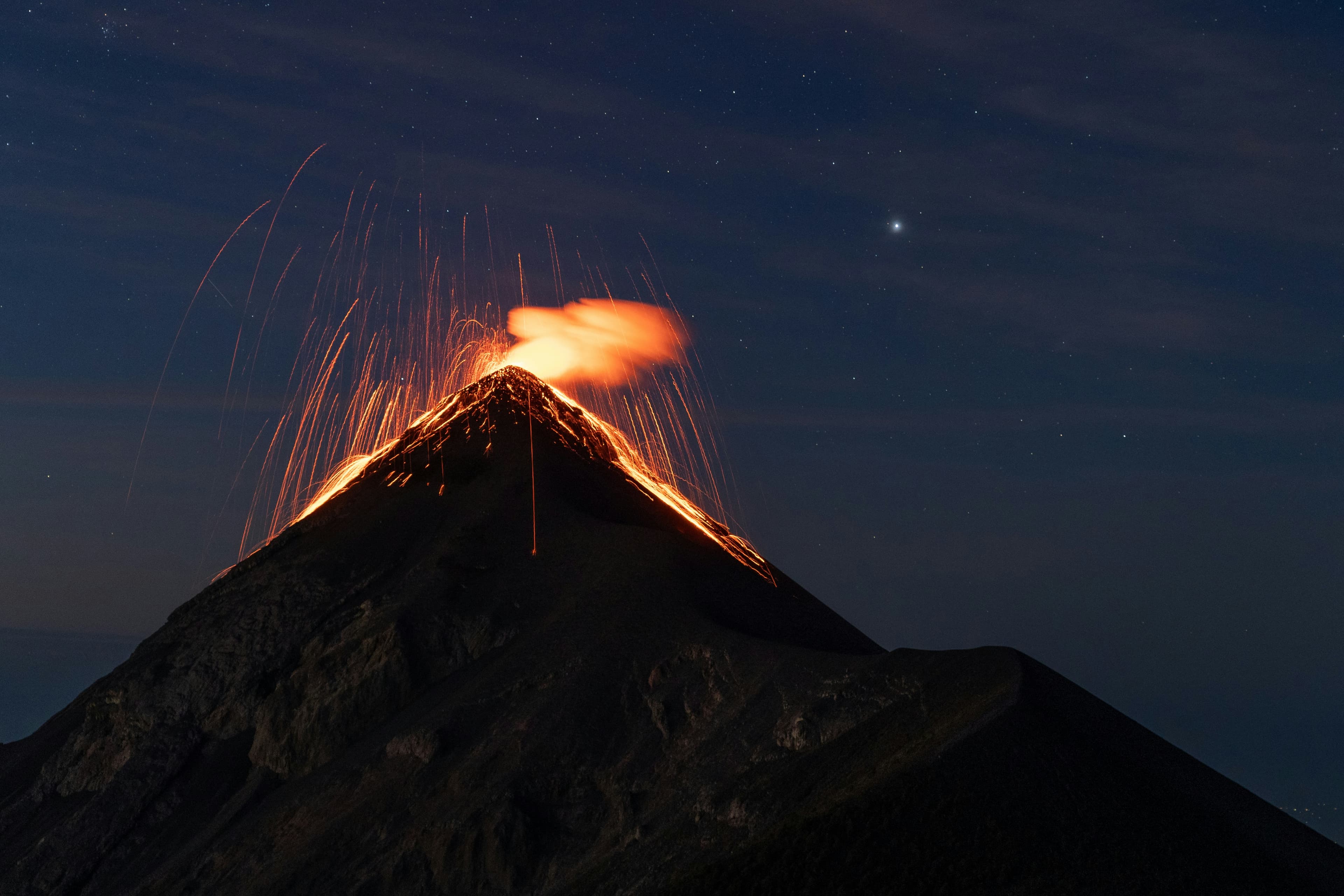 Acatenango volcano explosion at night